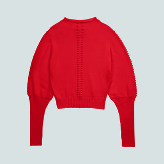 Back view of a red knitted sweater with long sleeves