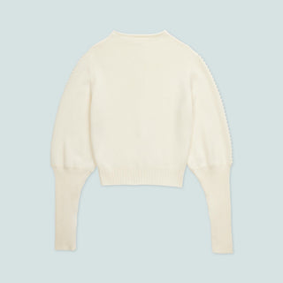 Back view of a cream-colored, lightweight sweater.